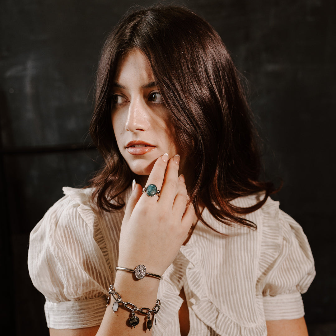 Person posing wearing Blue Apatite crystal fidget ring