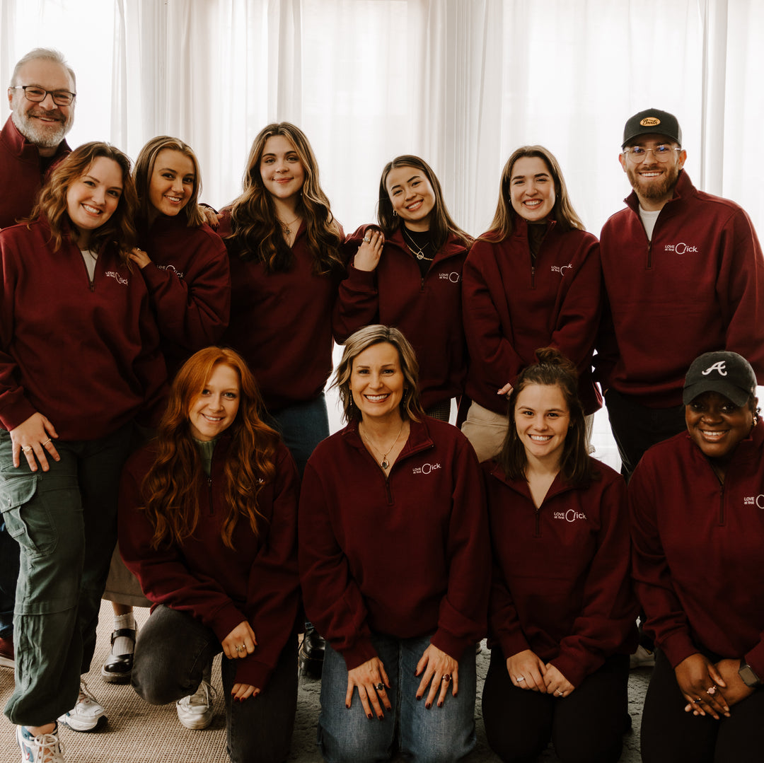 CONQUERing Crew Group Shot Wearing Maroon Sweatshirts