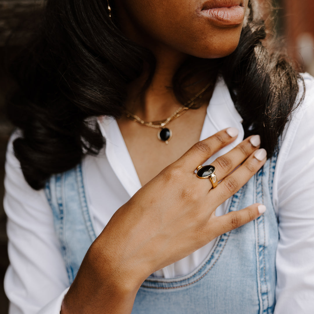 Person wearing Blue Aventurine Ring and Necklace