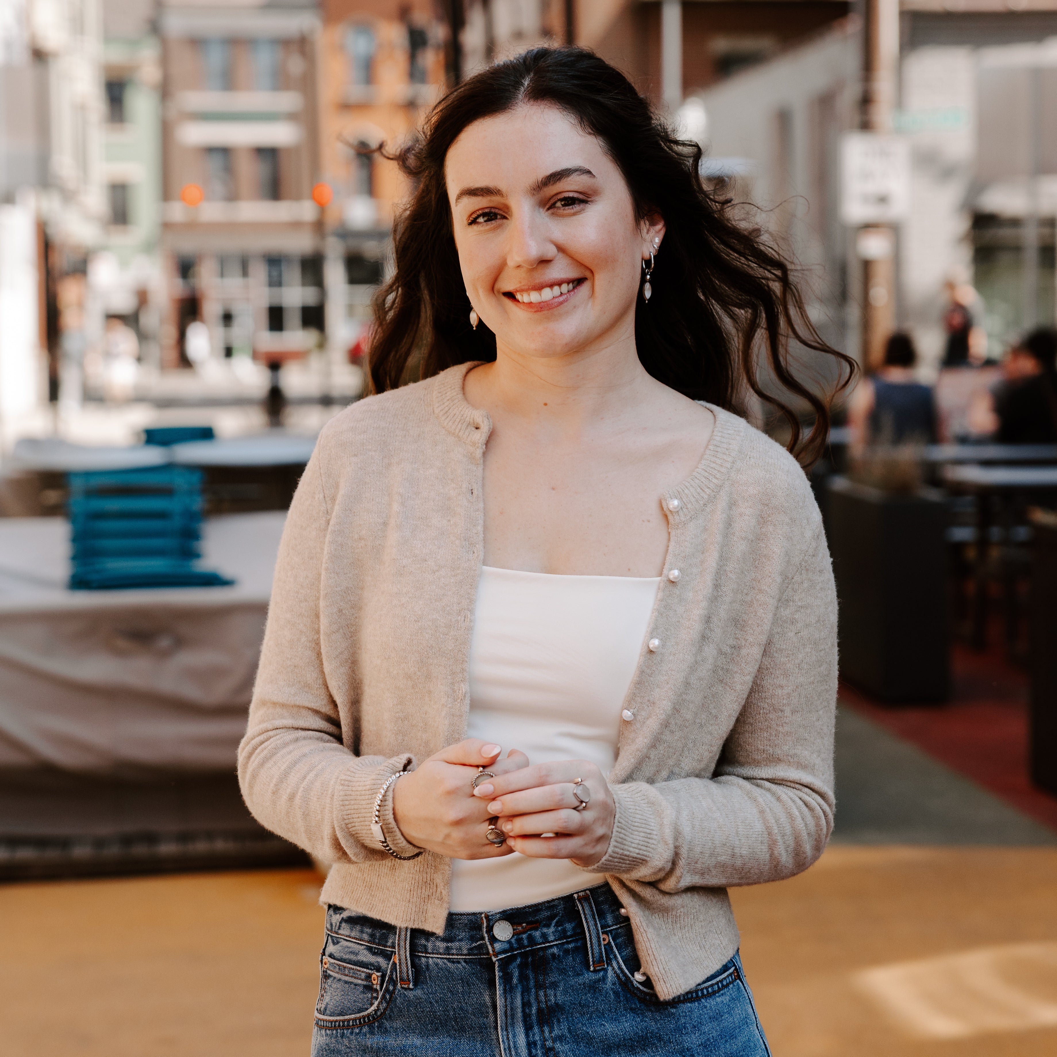 Photograph of person outside wearing anxiety jewelry