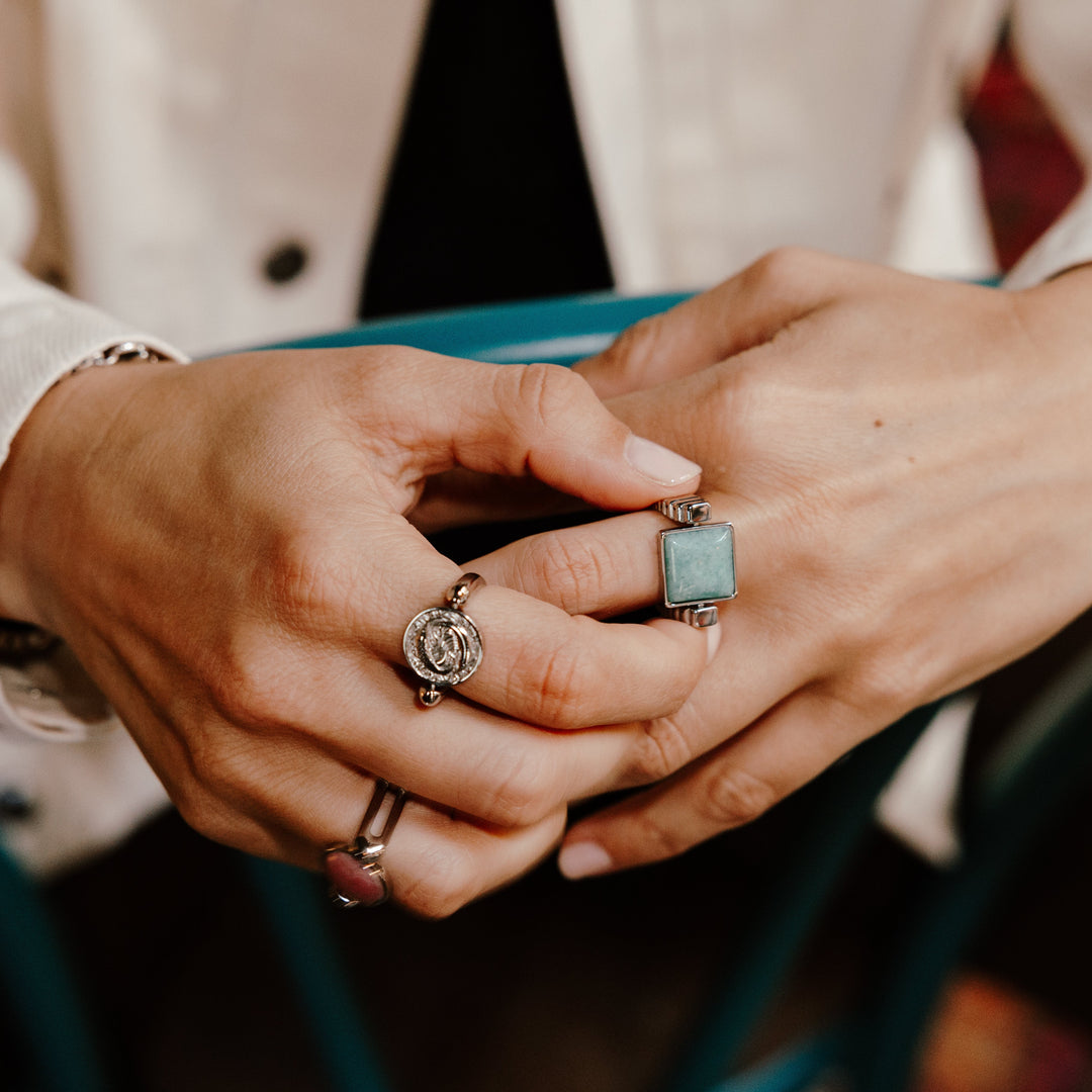 Person wearing fidget rings for calming and focus