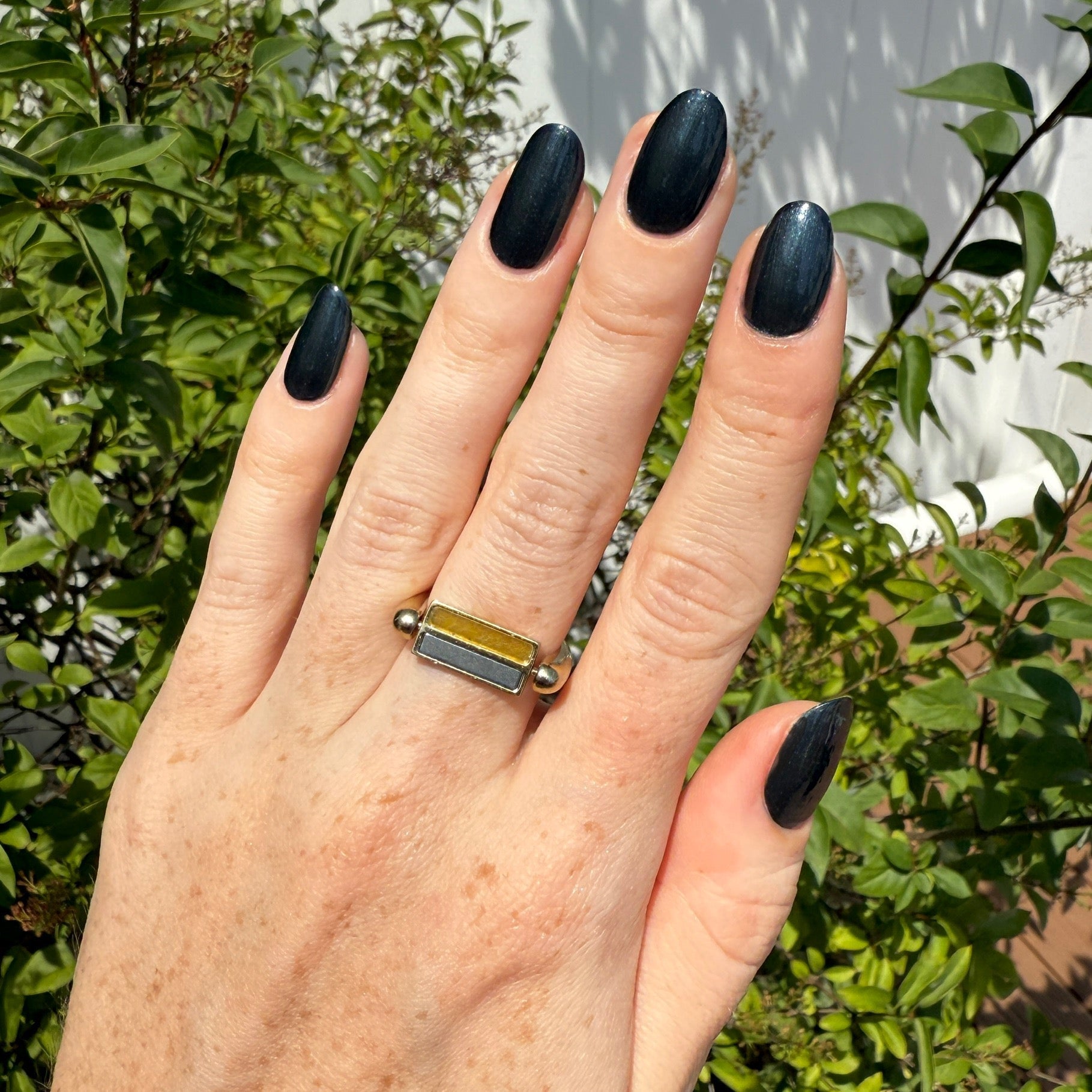 Lifestyle photo of Hematite & Peridot Crystal Ring