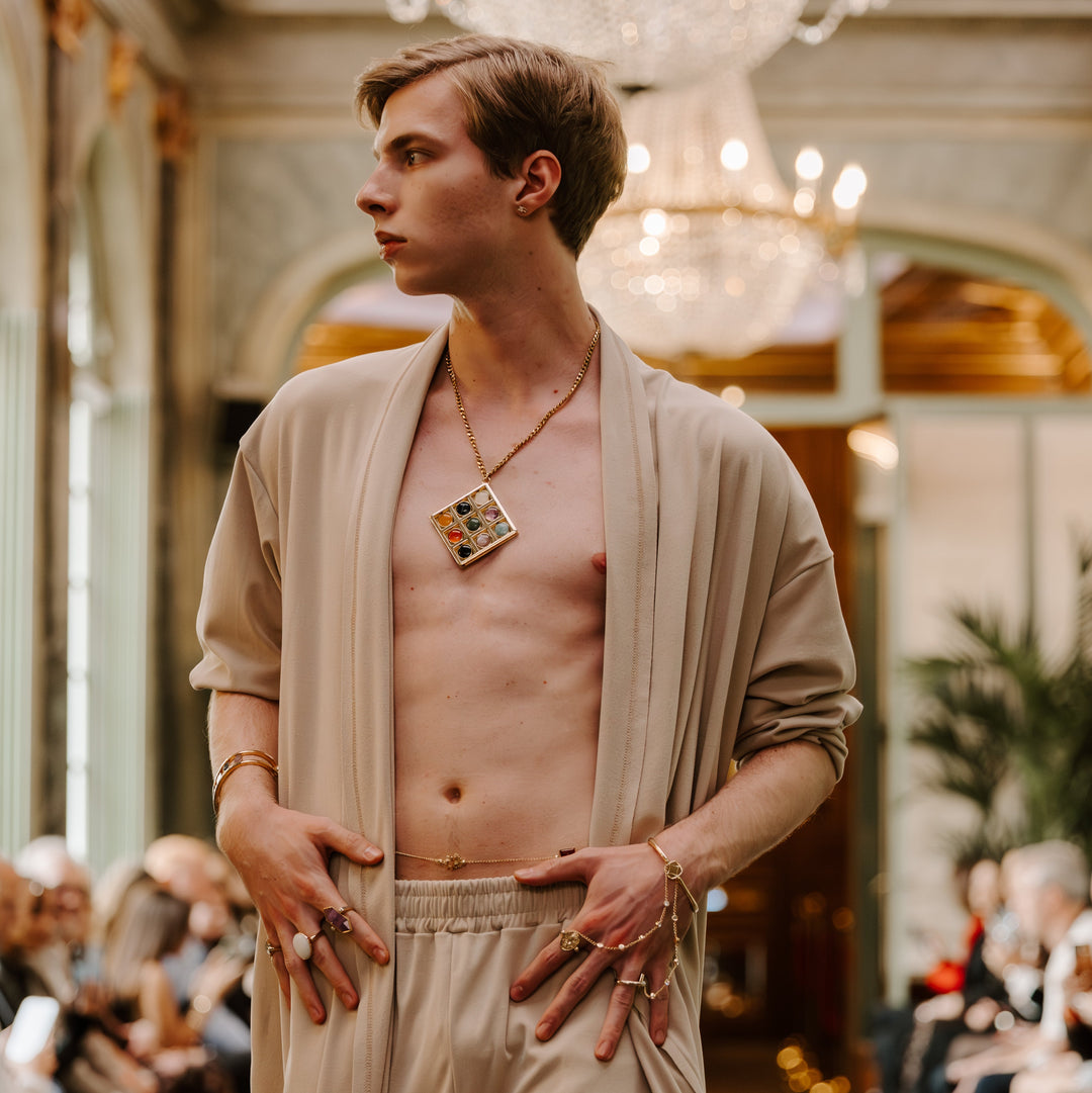Photograph of model at Paris Fashion Week showing off fidget jewelry