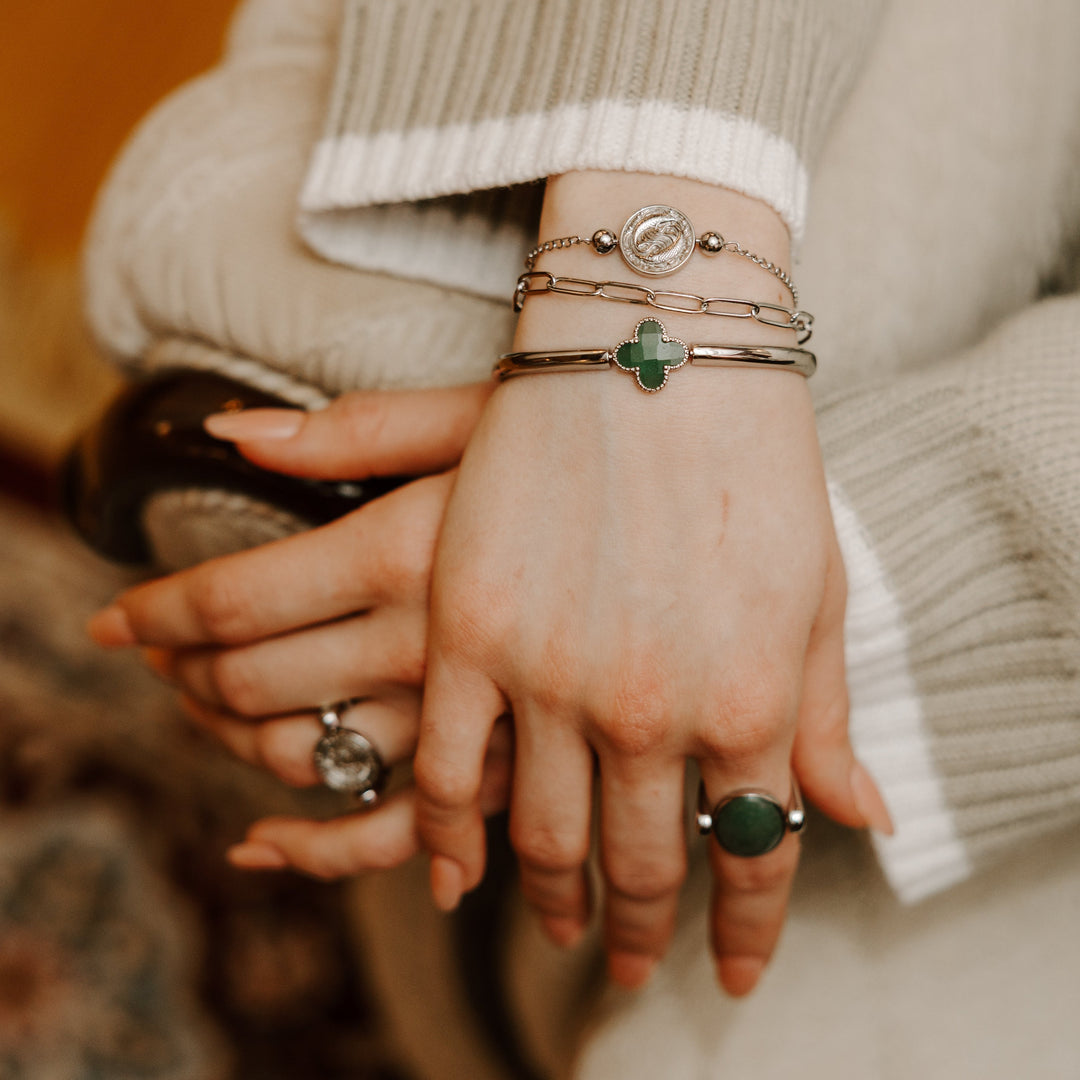 Lifestyle image of different types of fidget jewelry
