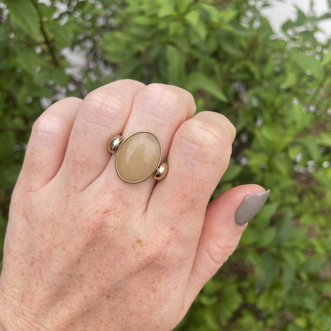 Lifestyle Image of Yellow Aventurine Oval Crystal Fidget Ring