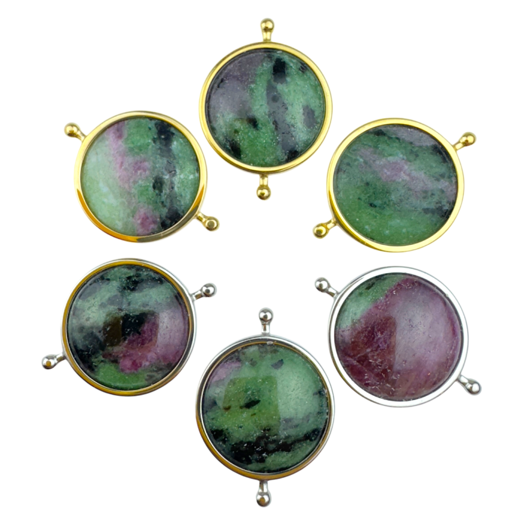 Six zoisite elements in silver and gold against a white background