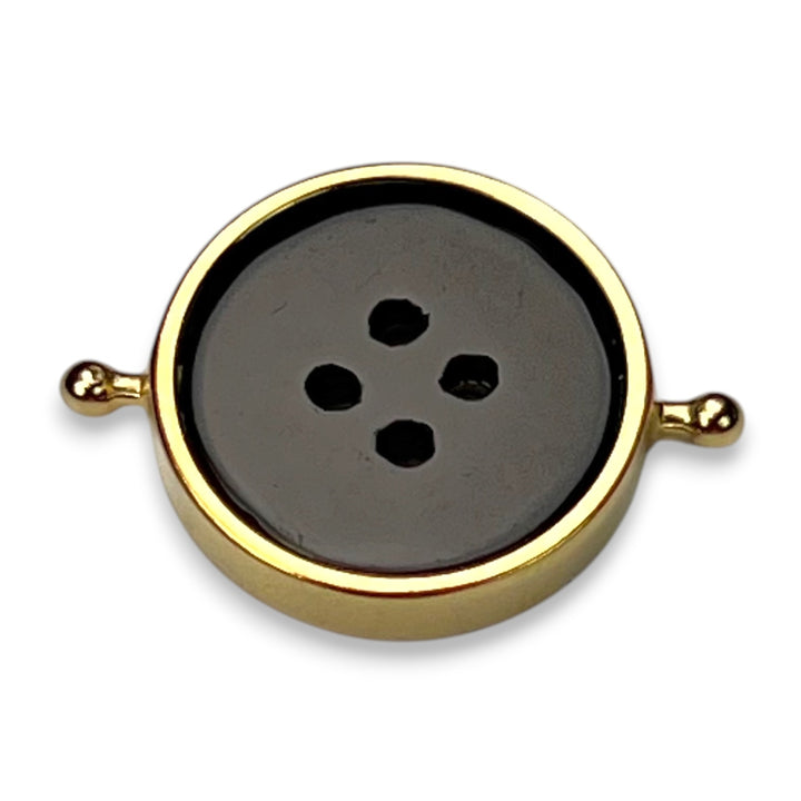 Reversible Crystal Button Element