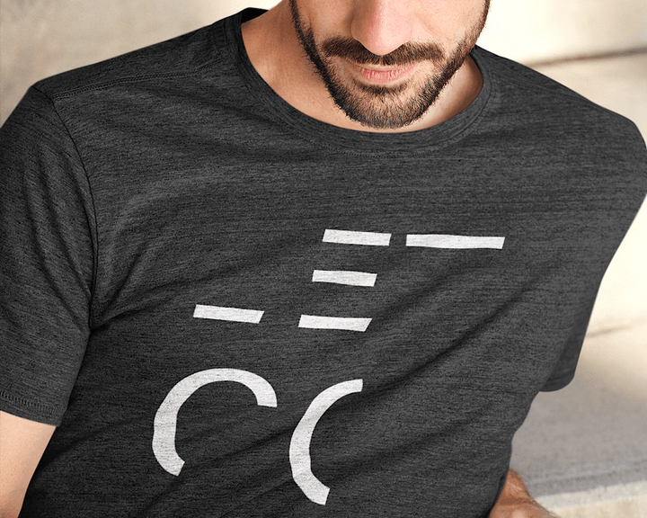 CONQUERing Unisex Abstract LET GO Charcoal Heather T-shirt